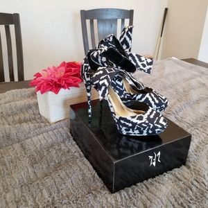 Black Delphine Platform Heels